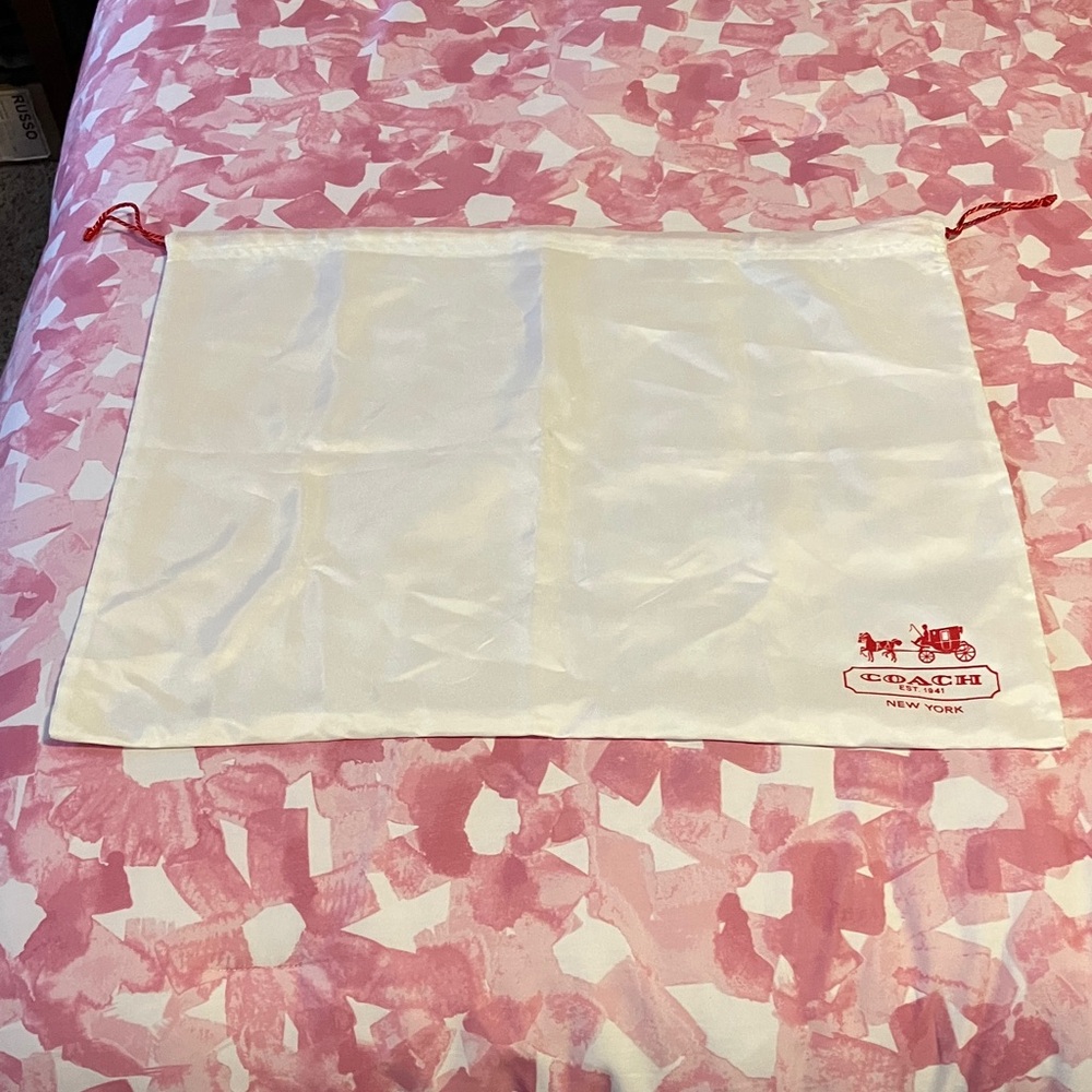 Coach White dust bag with Red Accents and drawstring.